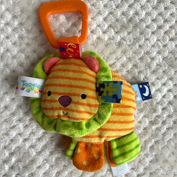 Taggies Plush Lion Squeeze Squeaker Hanging Stuffed Animal Toy - Picture 2 of 9